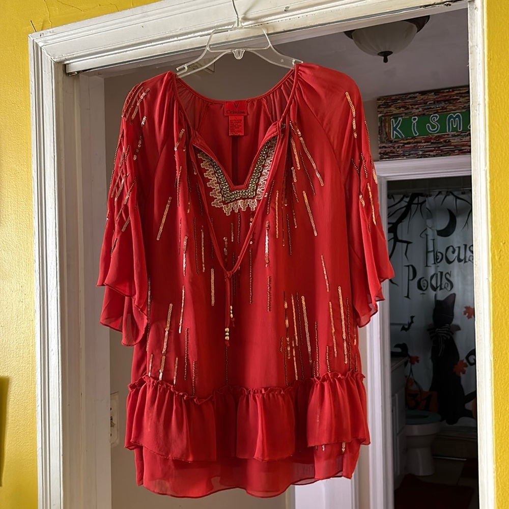 V Cristina blouse with sequin appliqué and beading around the chest area